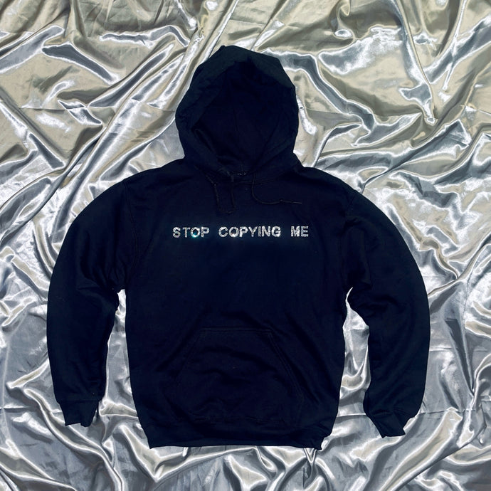 “STOP COPYING ME