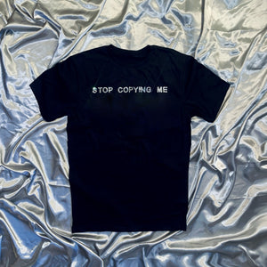 “STOP COPYING ME" T-Shirt